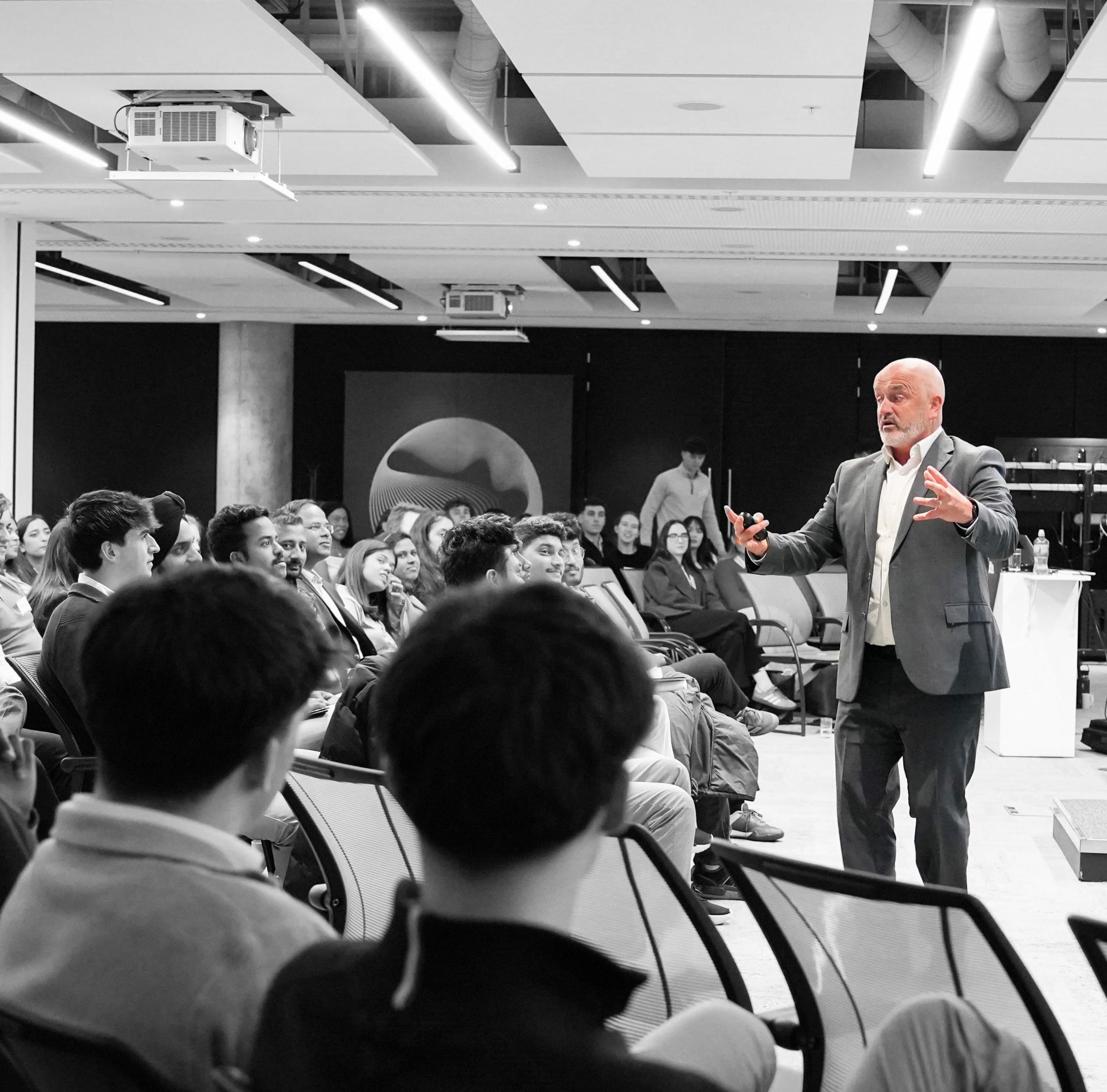 Enda O'Doherty motivational keynote speaker delivering corporate event presentation to business audience in Dublin Ireland