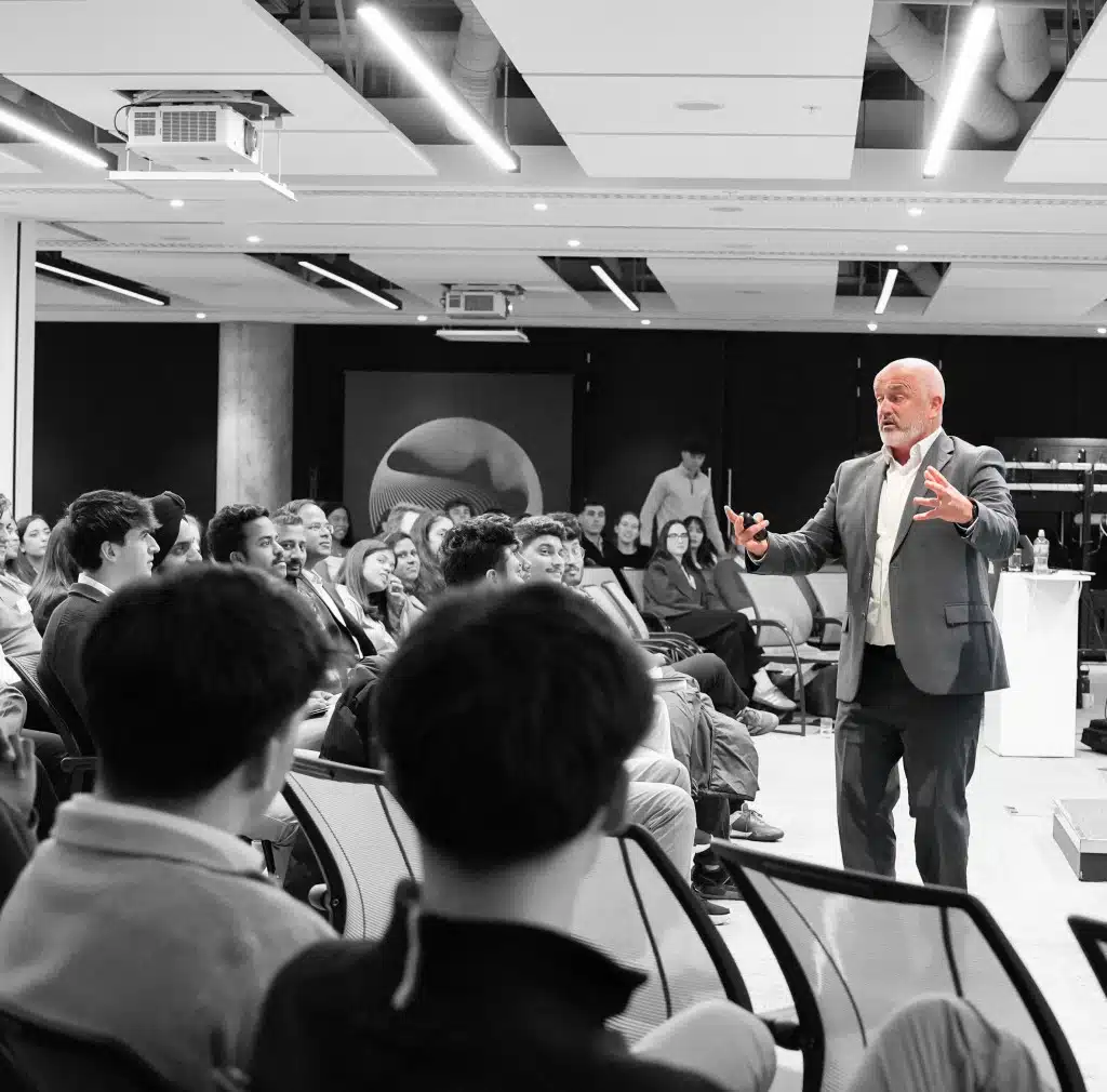 Corporate audience at an Enda O'Doherty keynote in Ireland, engaged during a resilience and leadership talk at a large conference event